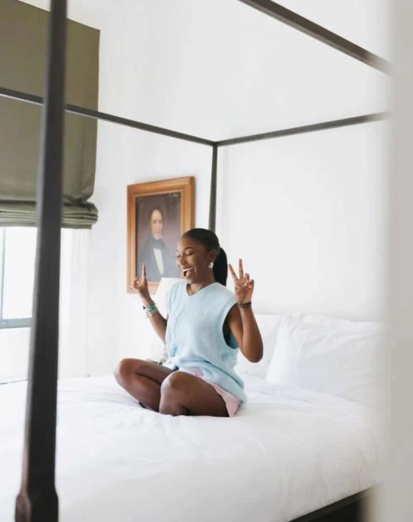 The Celestine boutique hotel in New Orleans guest on bed